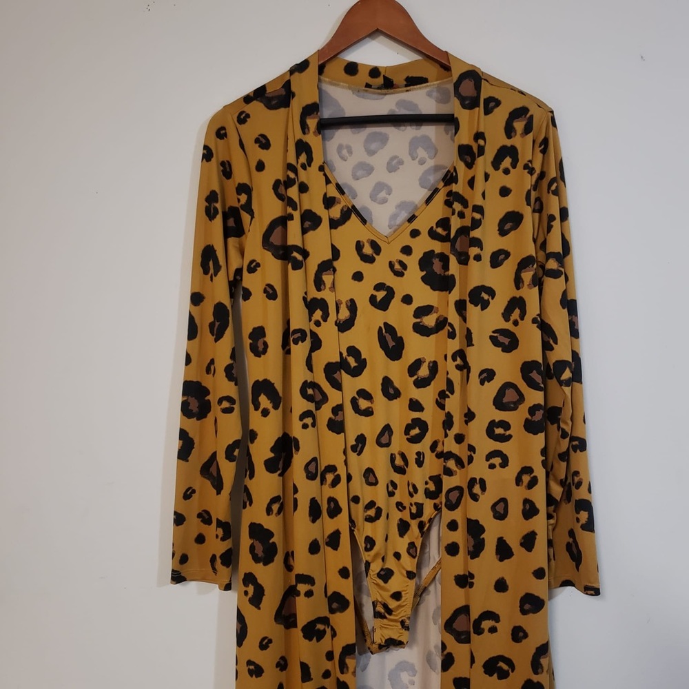 NWOT Cover up & bodysuit attached. Cheetah print